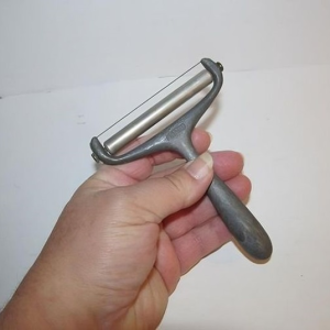 The Timeless Appeal of the Vintage Metal Presto Cheese Slicer: A Nostalgic Look Back