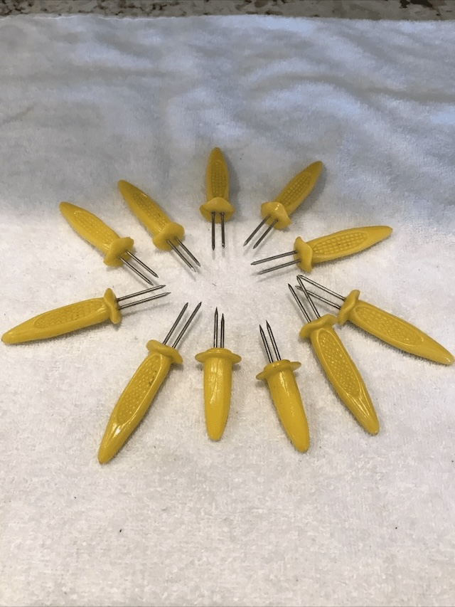 Nostalgic Corn Holders: A Glimpse Into Mid-20th Century Dining