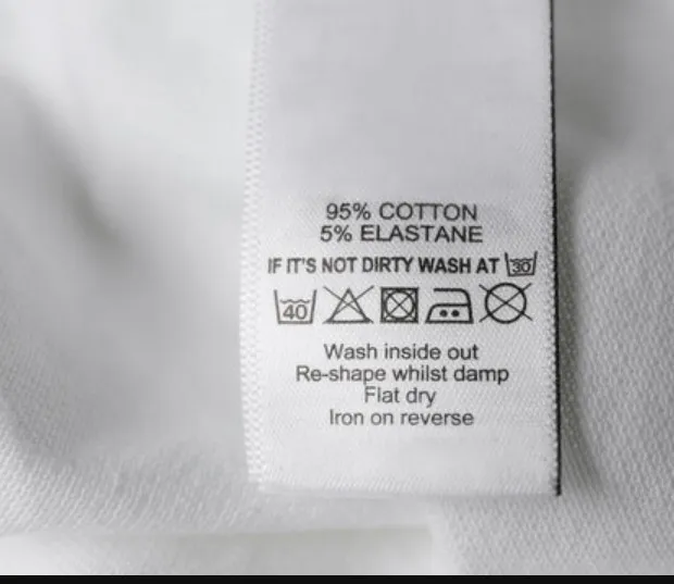 what the triangle symbol on clothes labels means