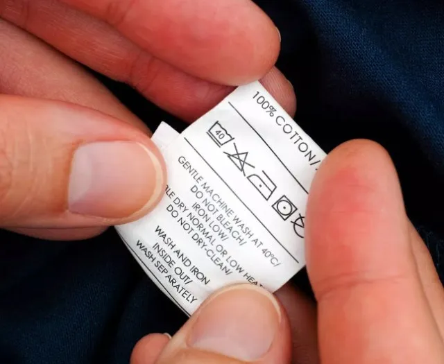 what the triangle symbol on clothes labels means