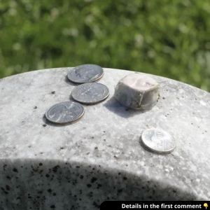 A Simple Gesture, A Deep Meaning: Coins on Graves and Their Powerful Symbolism