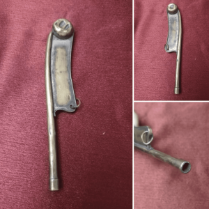 This dull bladed brass piece with hollow handle and “balls” on top. What is this thing