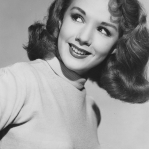 This 1951 portrait showcases the elegance of a star whose career spanned decades, earning her critical acclaim and prestigious award nods